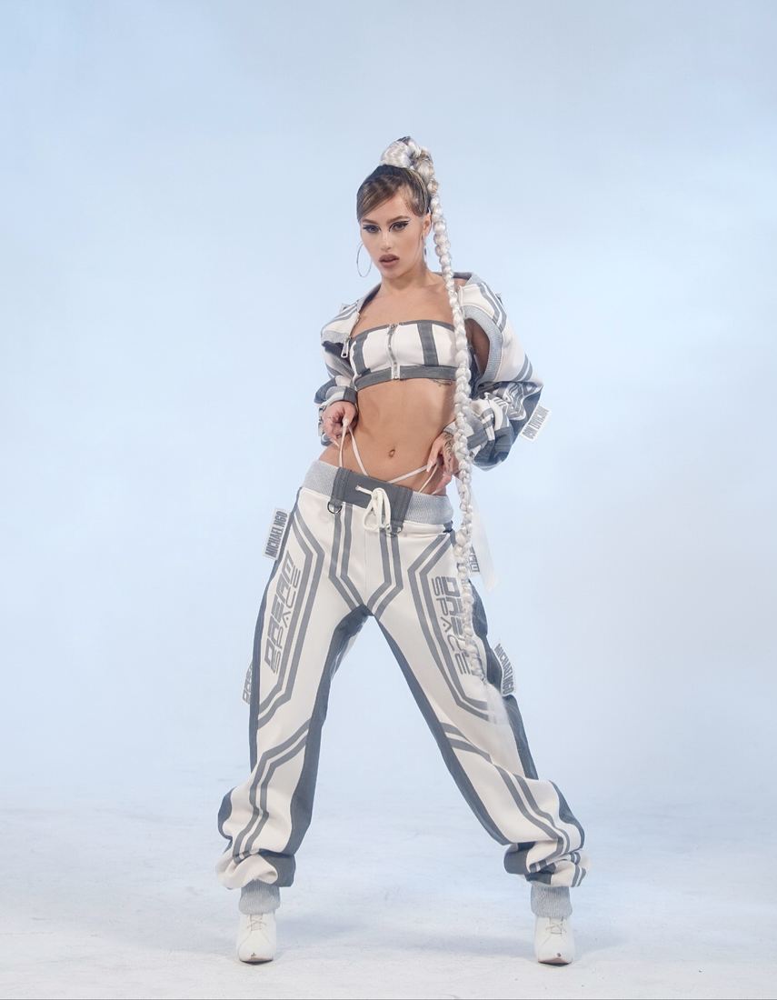 Full-length studio look on ice blue